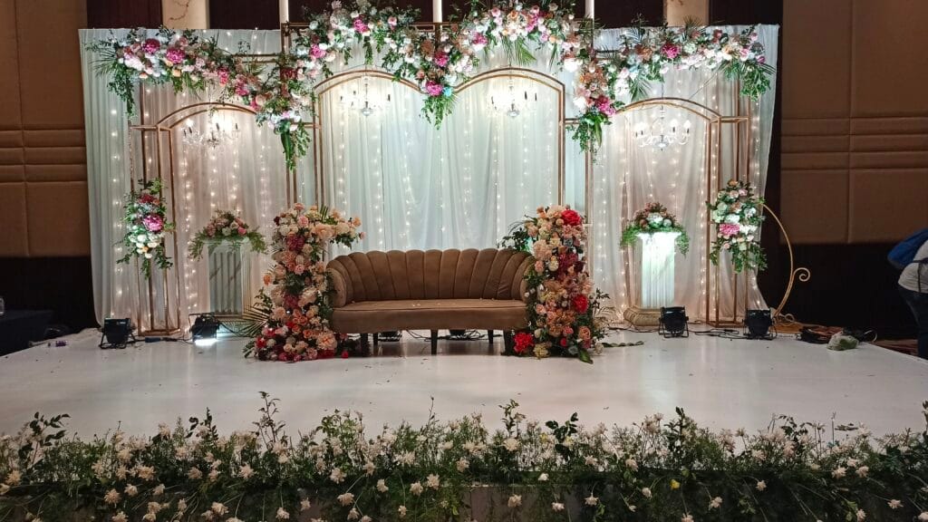 | Best Event Management Company in Chennai | Creative Event Organizers 2025 Elegant engagement ceremony stage decoration with floral arrangements by Creative Event Organizers – Chennai wedding planners