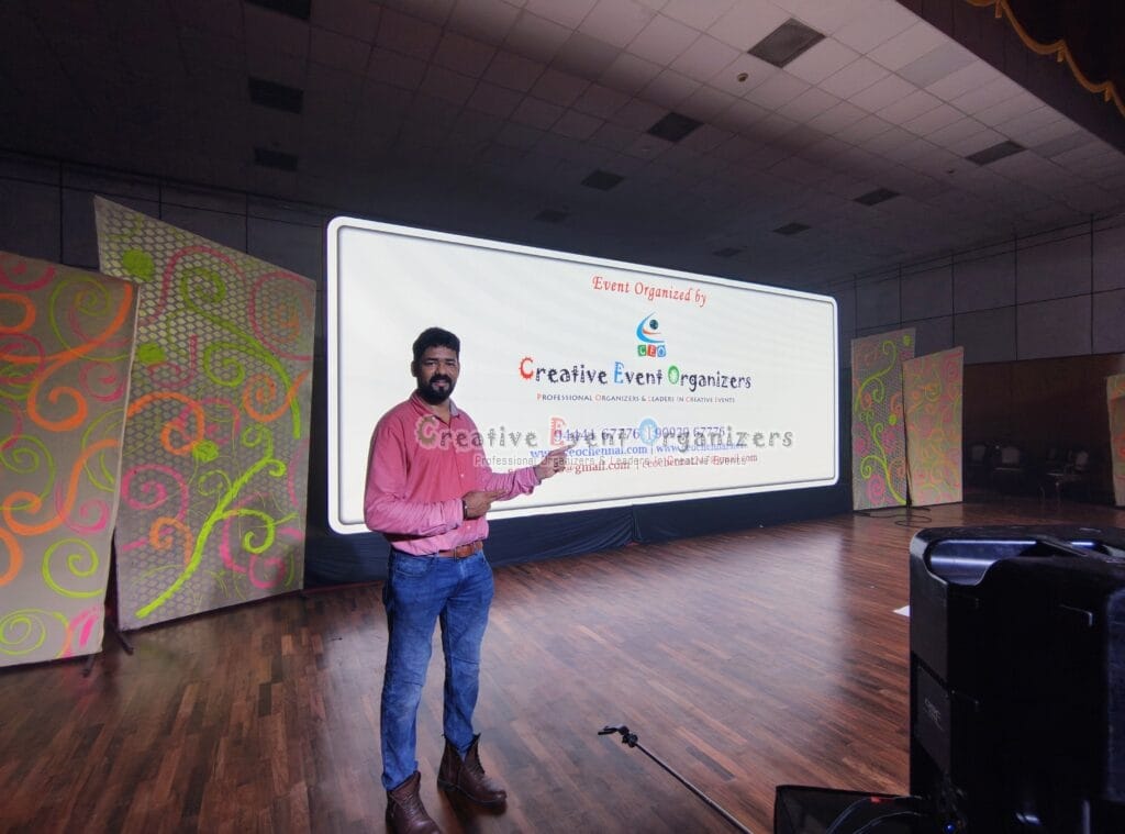 | Best Event Management Company in Chennai | Creative Event Organizers 2025 shine thomas owner of creative event organizersAdvanced sound and lighting setup with LED wall and projection screen for events in Chennai